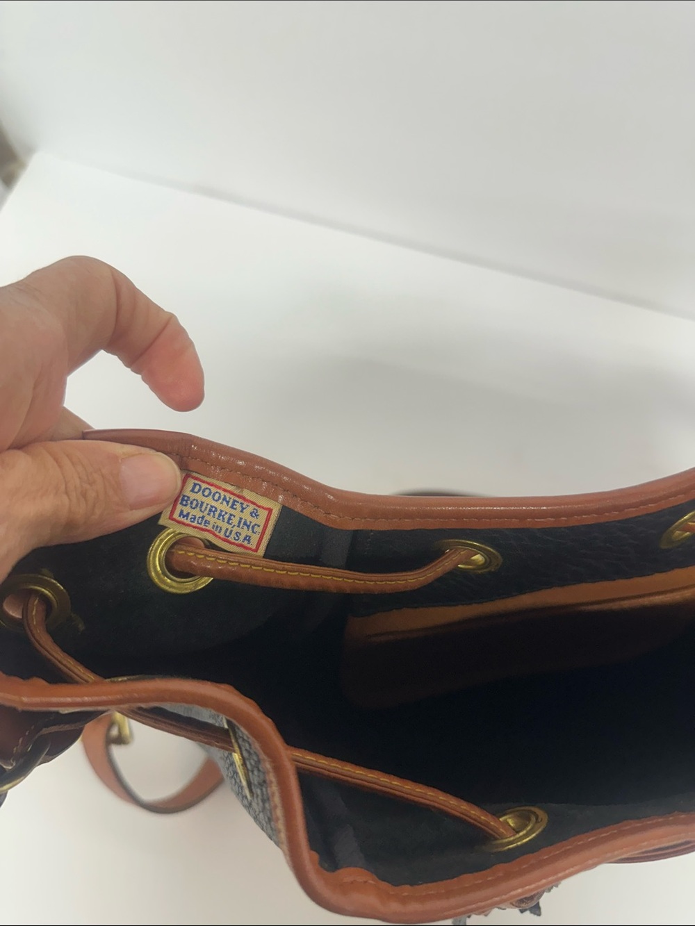 Dooney & Bourke Black Pebbled Leather Drawstring Bucket Bag with Tan Trim - Picture 11 of 13